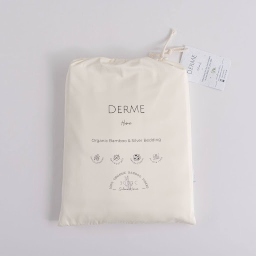 Derme Home organic bamboo and silver bedding packaging, showcasing eco-friendly, skin-safe materials for acne prevention.